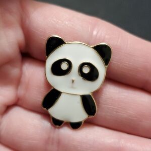 Gold tone black and white panda brooch